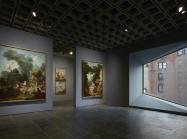 Four grand panels of Fragonard’s series The Progress of Love are shown together at Frick Madison in a gallery illuminated by one of Marcel Breuer’s trapezoidal windows. This view shows two of the 1771–72 paintings, with two later overdoors visible in the next gallery.