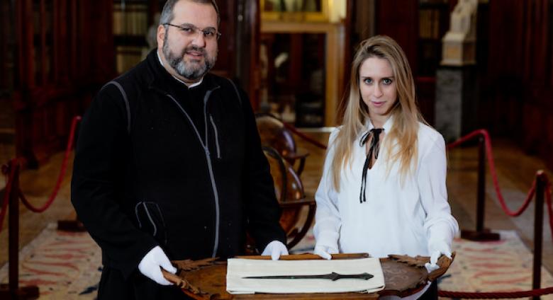 Father Serafino Jamourlian and Vittoria Dall'Armellina with the sword