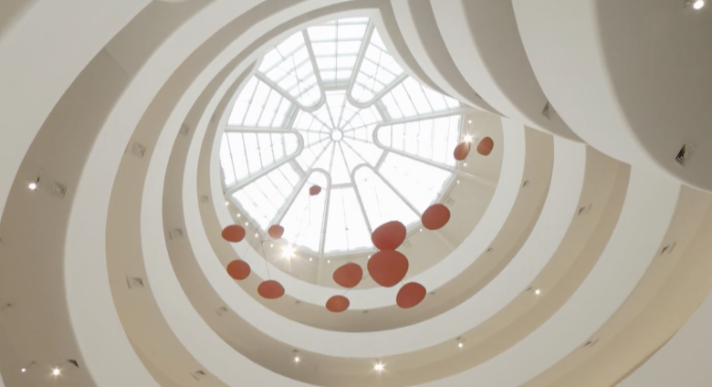 Looking up at Red Lilly pads in museum