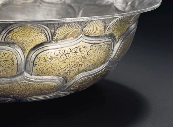 A very rare and important large parcel-gilt silver bowl, Tang dynasty (AD 618-907). Diameter 9⅝ in. Sold for $3,495,000.